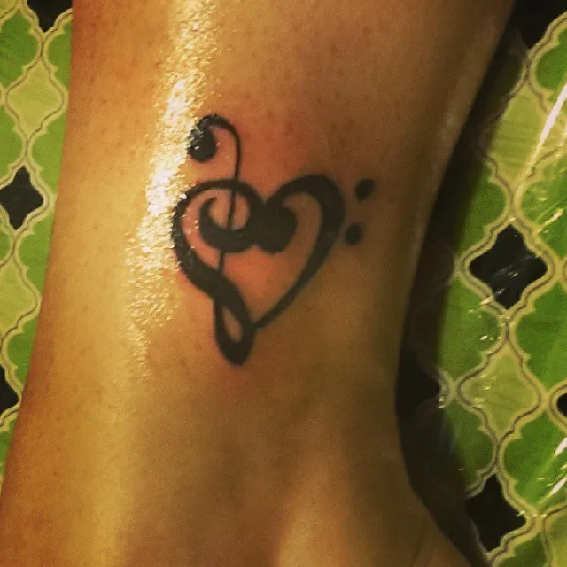 Tattoo by TJ Cornelius at Fallen Raven Tattoo Studio