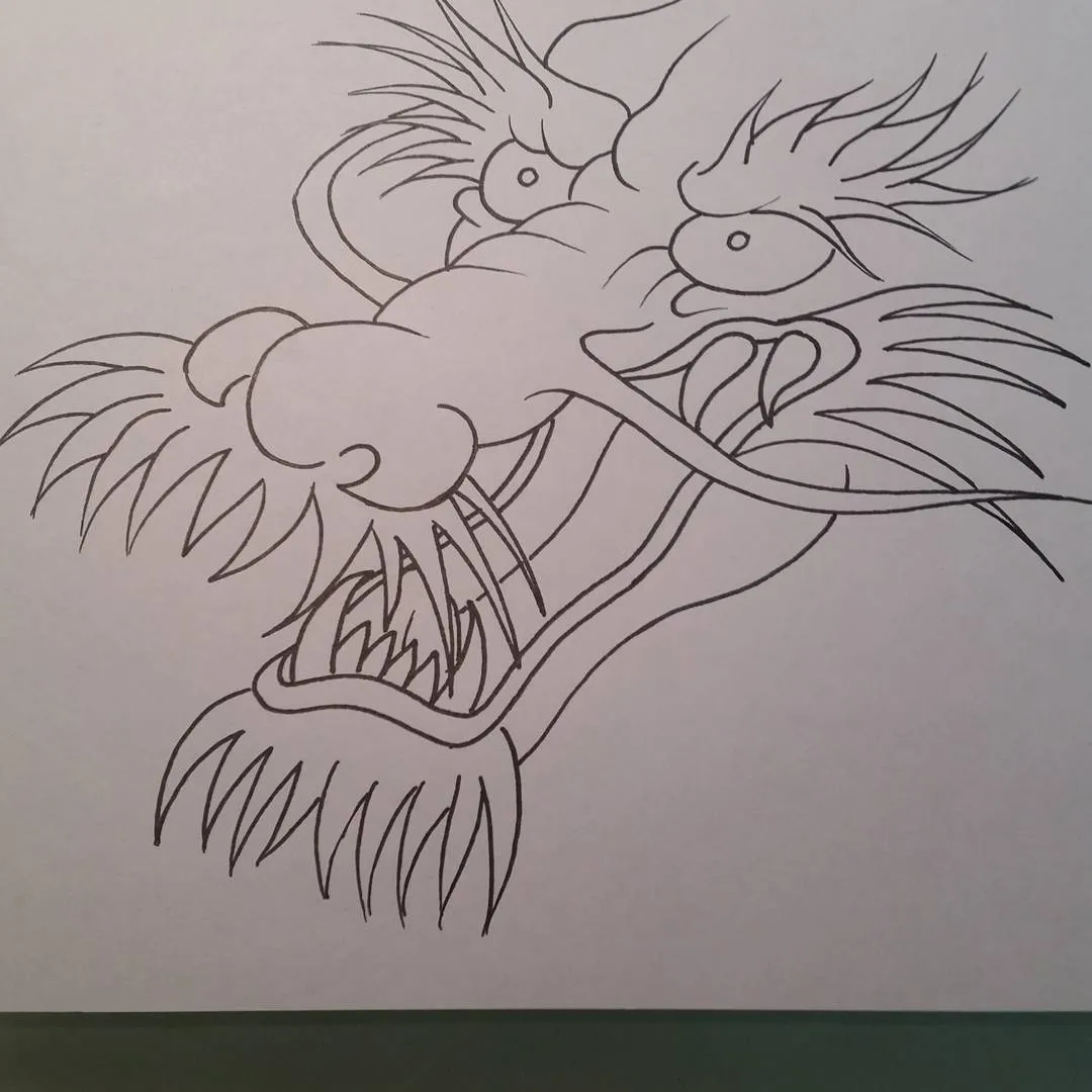 Tattoo by TJ Cornelius at Fallen Raven Tattoo Studio