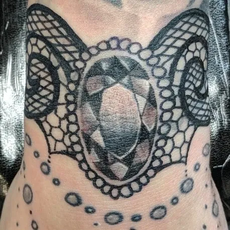 Tattoo by TJ Cornelius at Fallen Raven Tattoo Studio