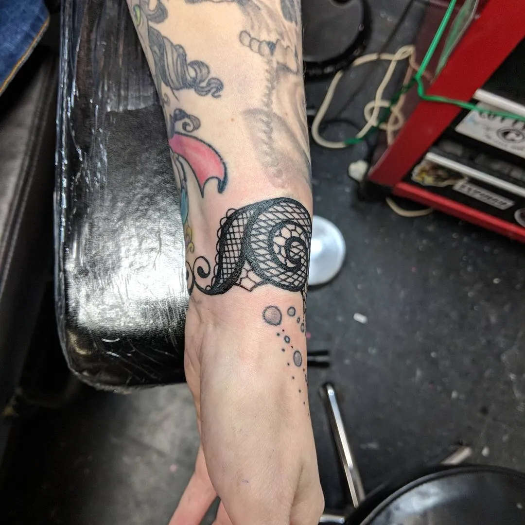 Tattoo by TJ Cornelius at Fallen Raven Tattoo Studio