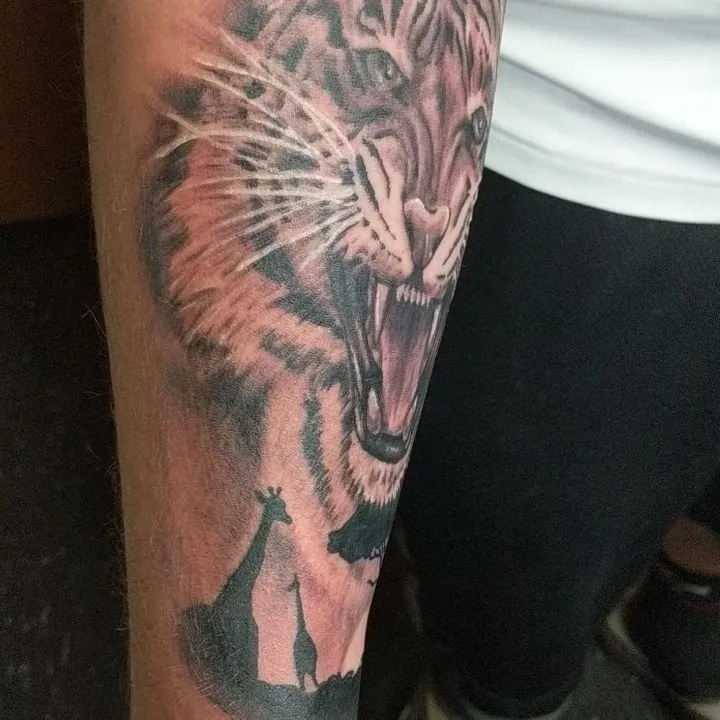 Tattoo by TJ Cornelius at Fallen Raven Tattoo Studio