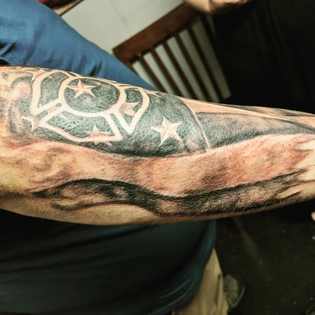 Tattoo by TJ Cornelius at Fallen Raven Tattoo Studio