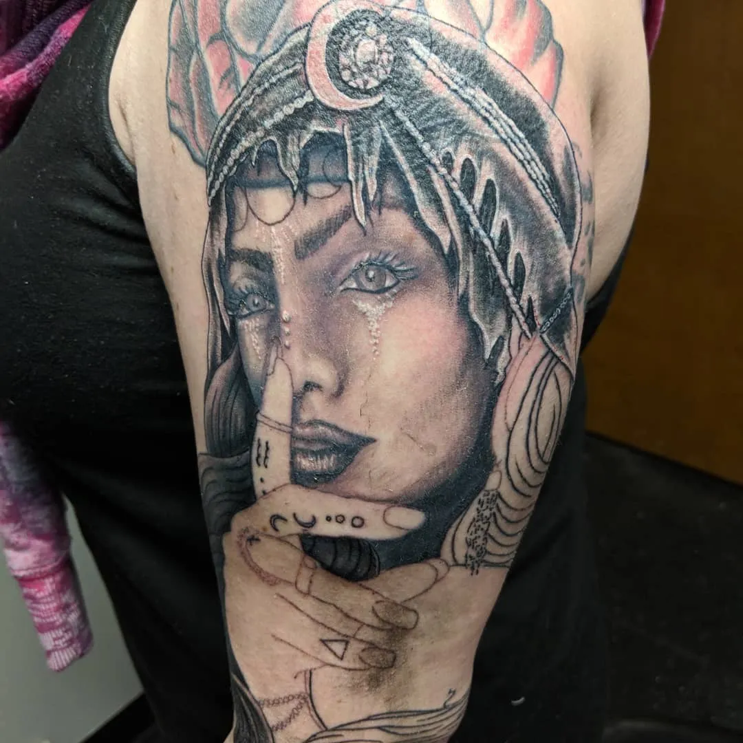 Tattoo by TJ Cornelius at Fallen Raven Tattoo Studio