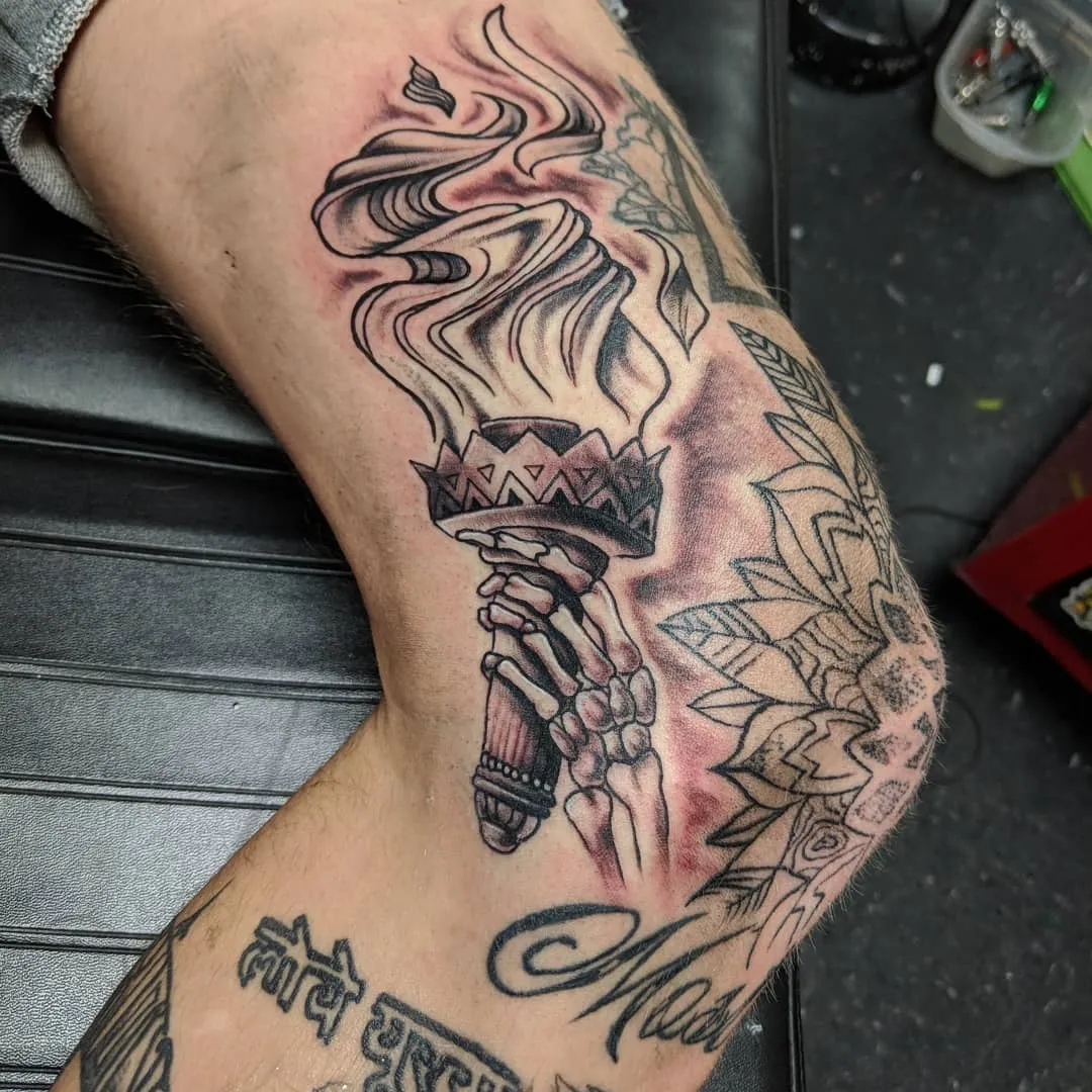 Tattoo by TJ Cornelius at Fallen Raven Tattoo Studio