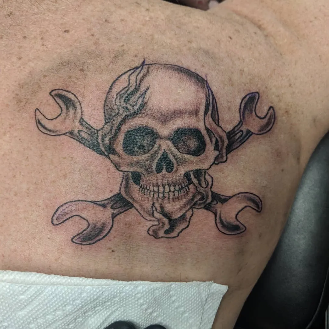 Tattoo by TJ Cornelius at Fallen Raven Tattoo Studio