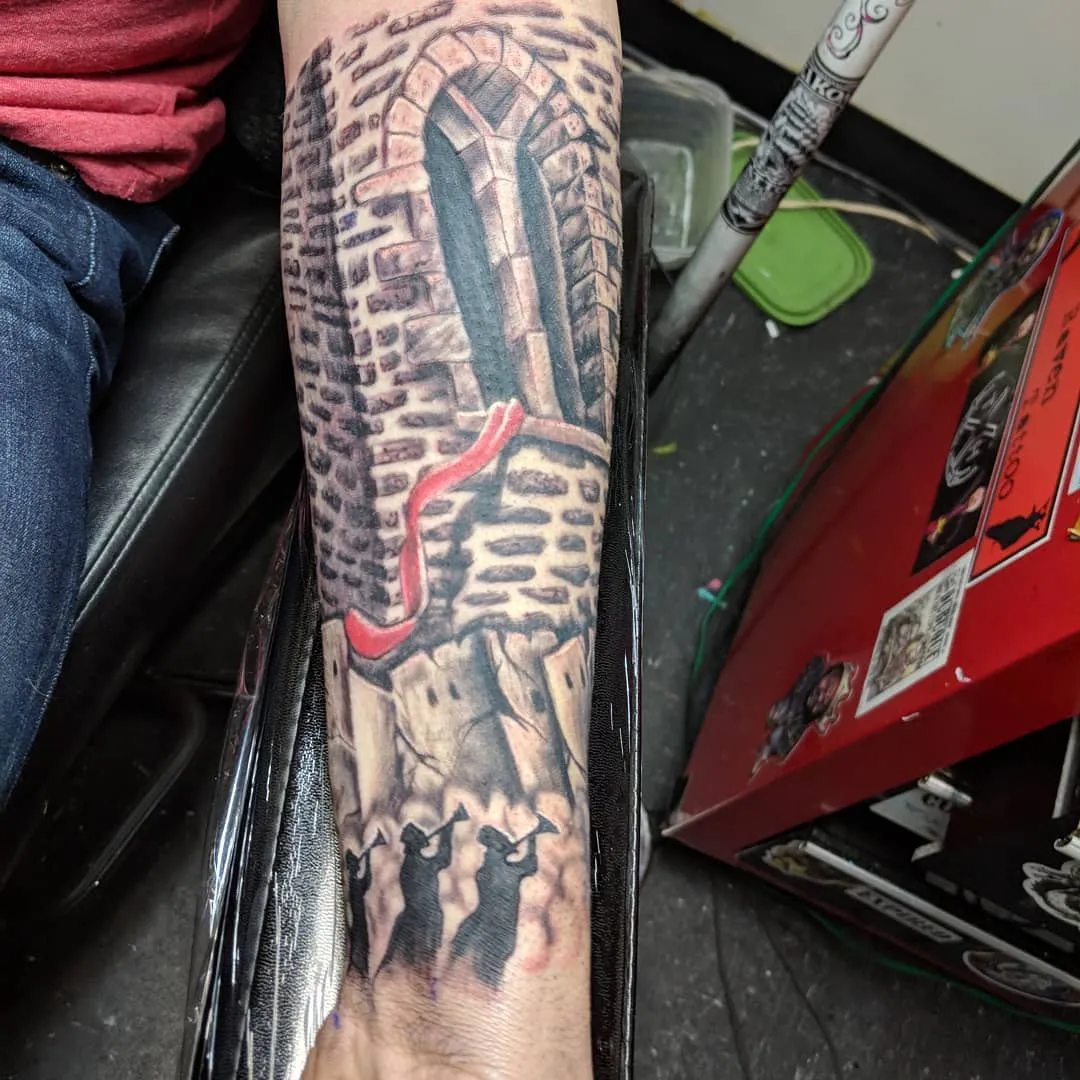 Tattoo by TJ Cornelius at Fallen Raven Tattoo Studio