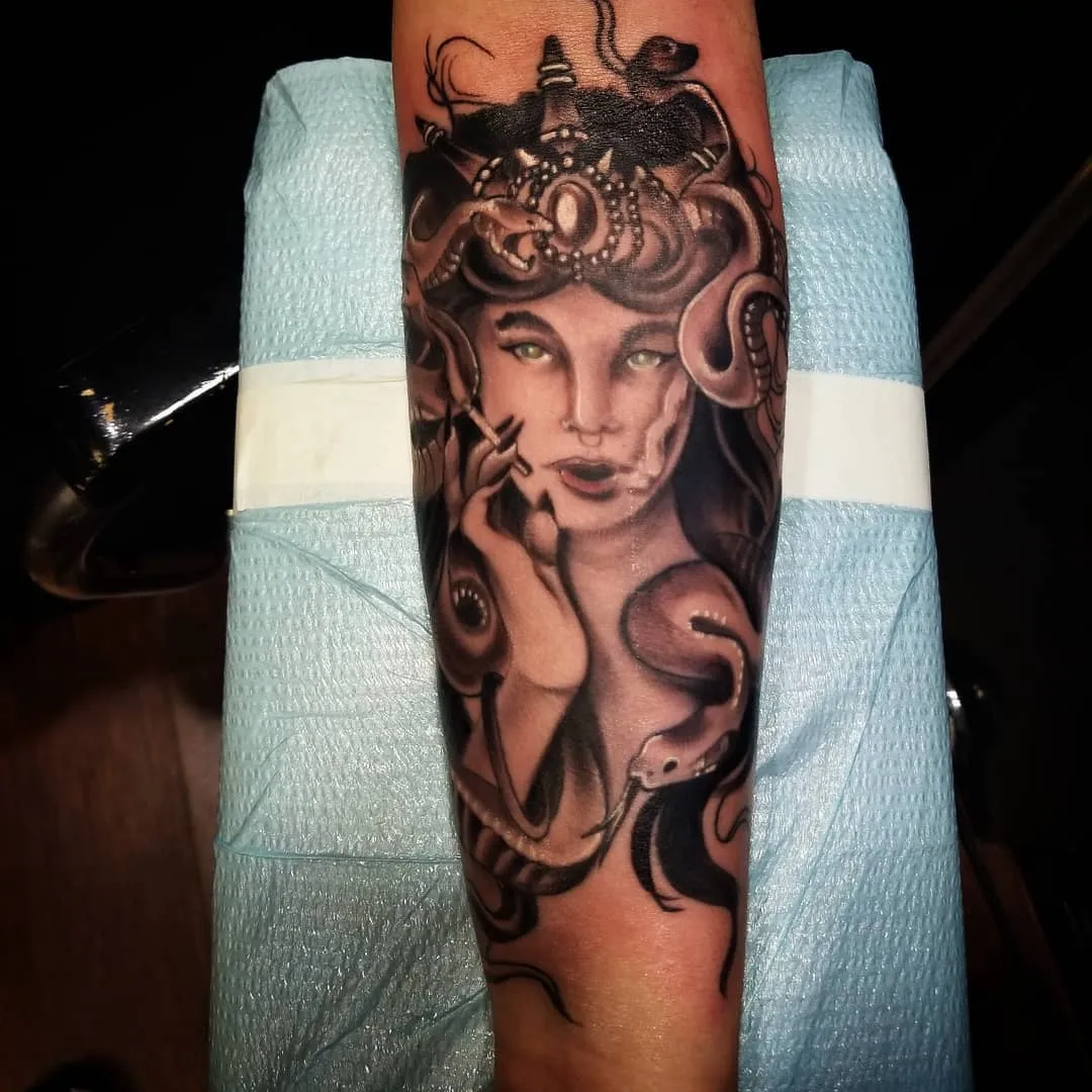 Tattoo by Pete Delia at Fallen Raven Tattoo Studio