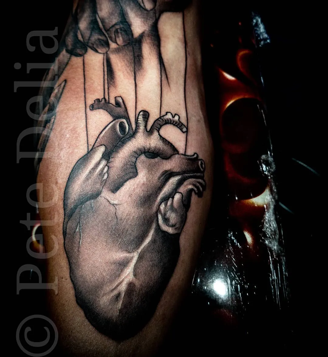 Tattoo by Pete Delia at Fallen Raven Tattoo Studio