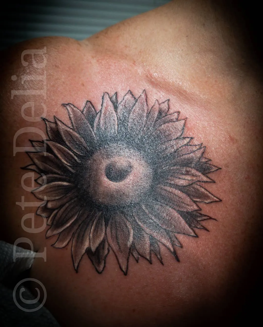 Tattoo by Pete Delia at Fallen Raven Tattoo Studio