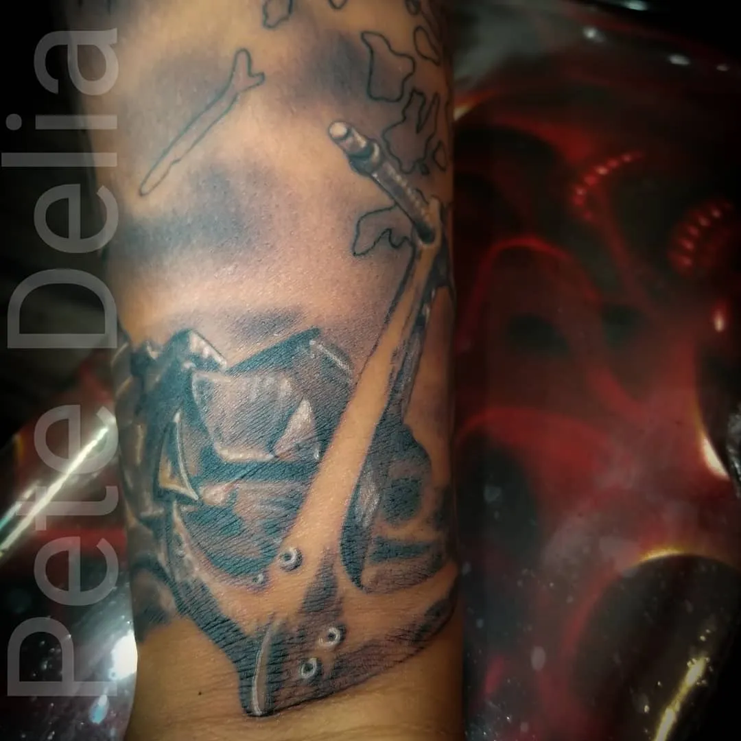 Tattoo by Pete Delia at Fallen Raven Tattoo Studio