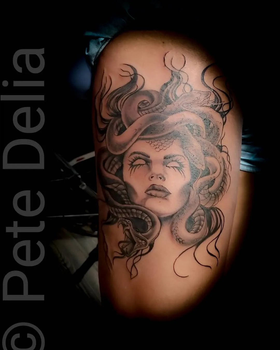 Tattoo by Pete Delia at Fallen Raven Tattoo Studio