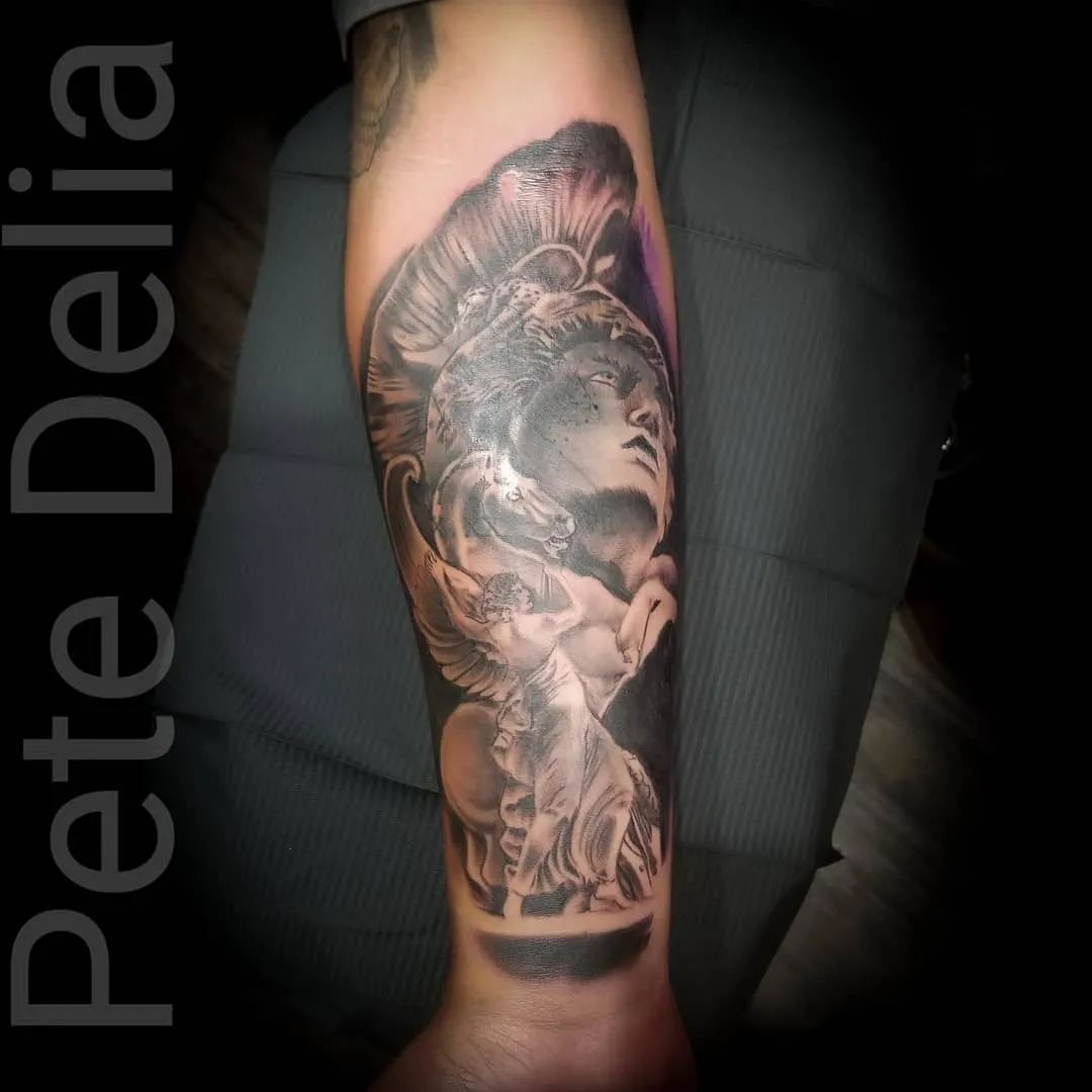 Tattoo by Pete Delia at Fallen Raven Tattoo Studio