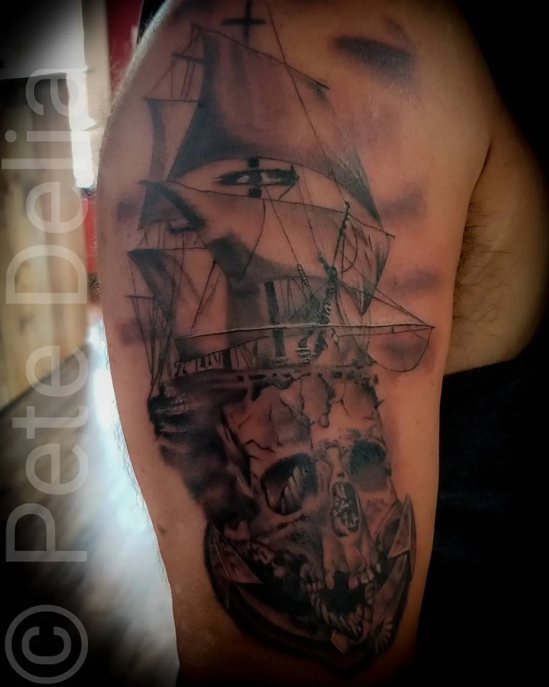 Tattoo by Pete Delia at Fallen Raven Tattoo Studio