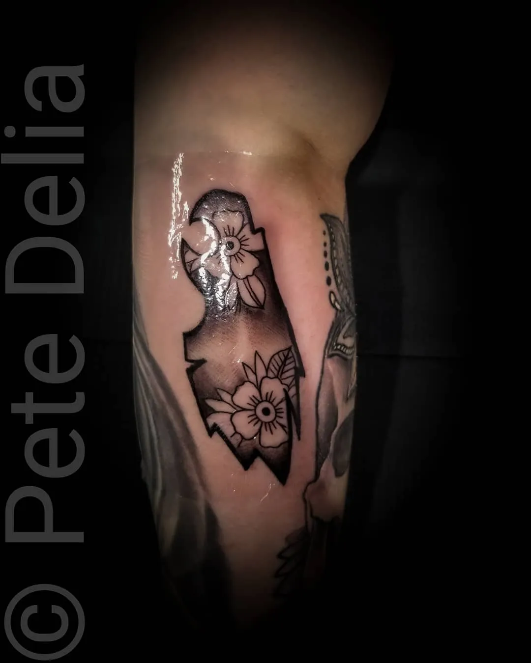 Tattoo by Pete Delia at Fallen Raven Tattoo Studio