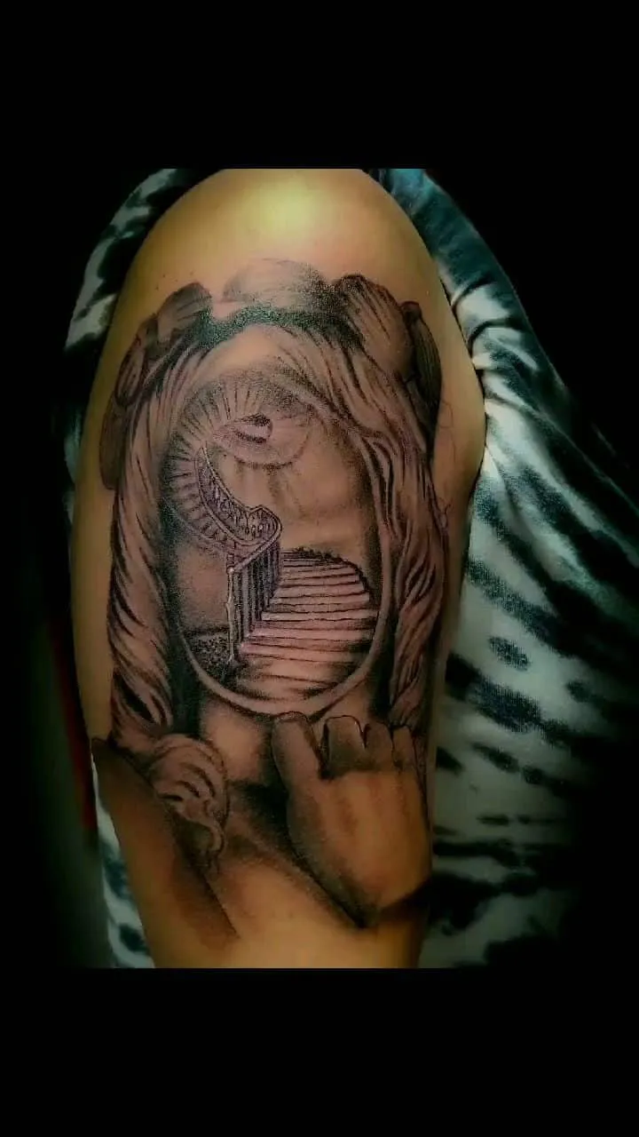 Tattoo by Pete Delia at Fallen Raven Tattoo Studio