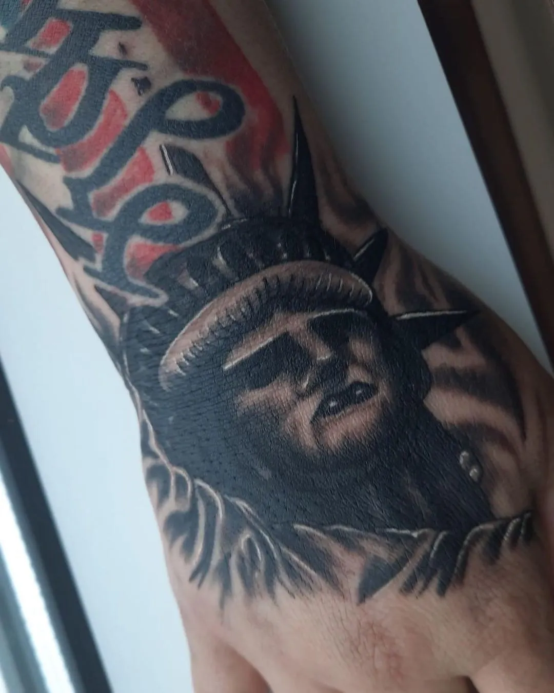 Tattoo by TJ Cornelius at Fallen Raven Tattoo Studio