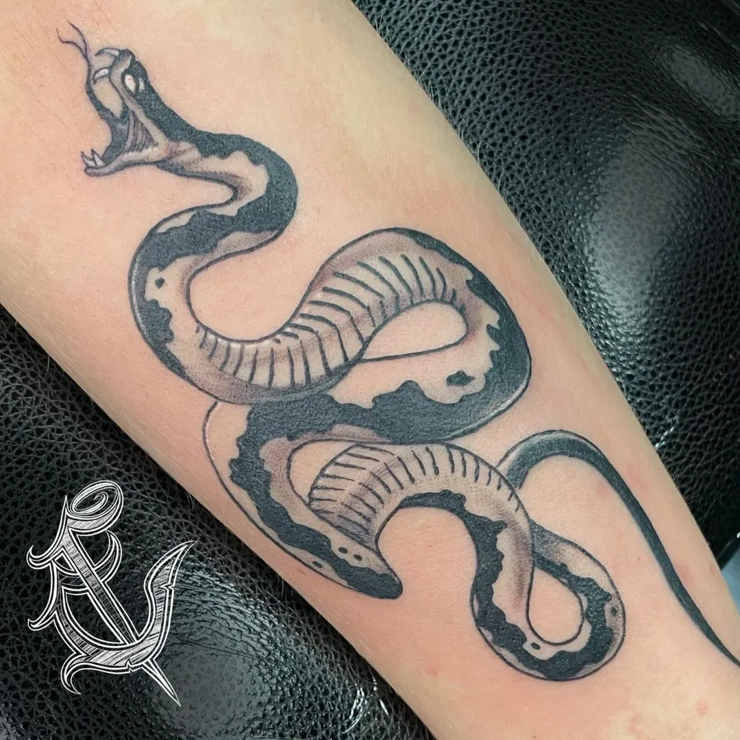 Tattoo by TJ Cornelius at Fallen Raven Tattoo Studio