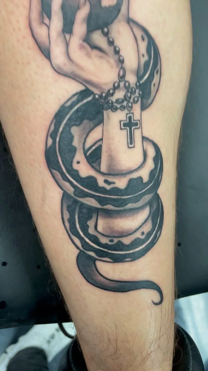 Tattoo by TJ Cornelius at Fallen Raven Tattoo Studio