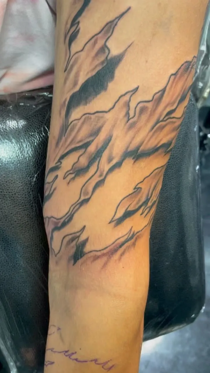 Tattoo by TJ Cornelius at Fallen Raven Tattoo Studio