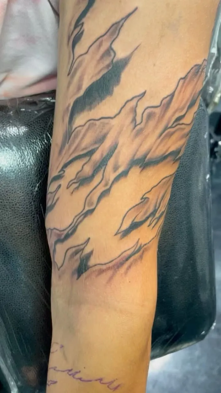 Tattoo by TJ Cornelius at Fallen Raven Tattoo Studio