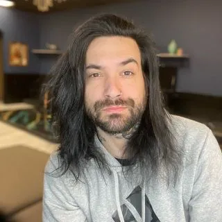 Tattoo by TJ Cornelius at Fallen Raven Tattoo Studio