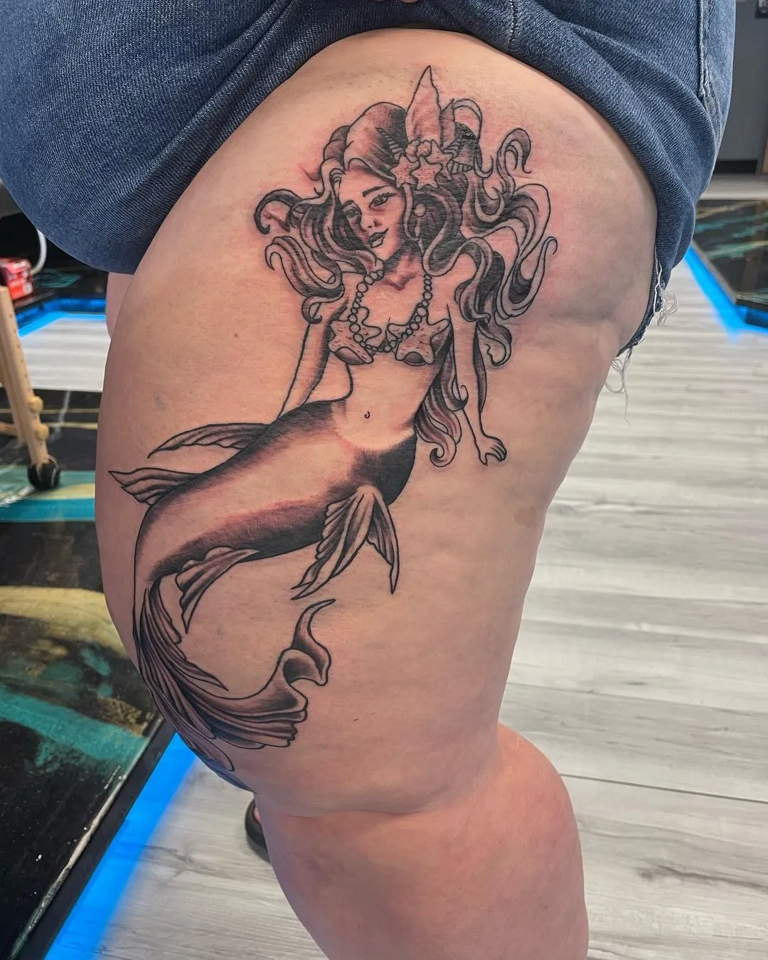 Tattoo by TJ Cornelius at Fallen Raven Tattoo Studio