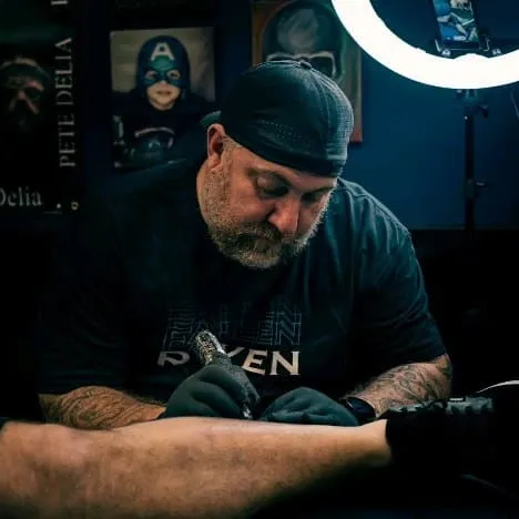 Tattoo by Pete Delia at Fallen Raven Tattoo Studio