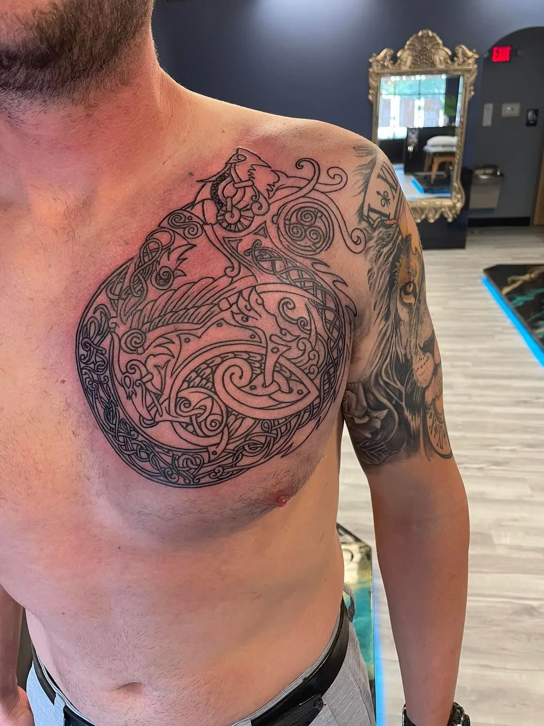 Tattoo by TJ Cornelius at Fallen Raven Tattoo Studio