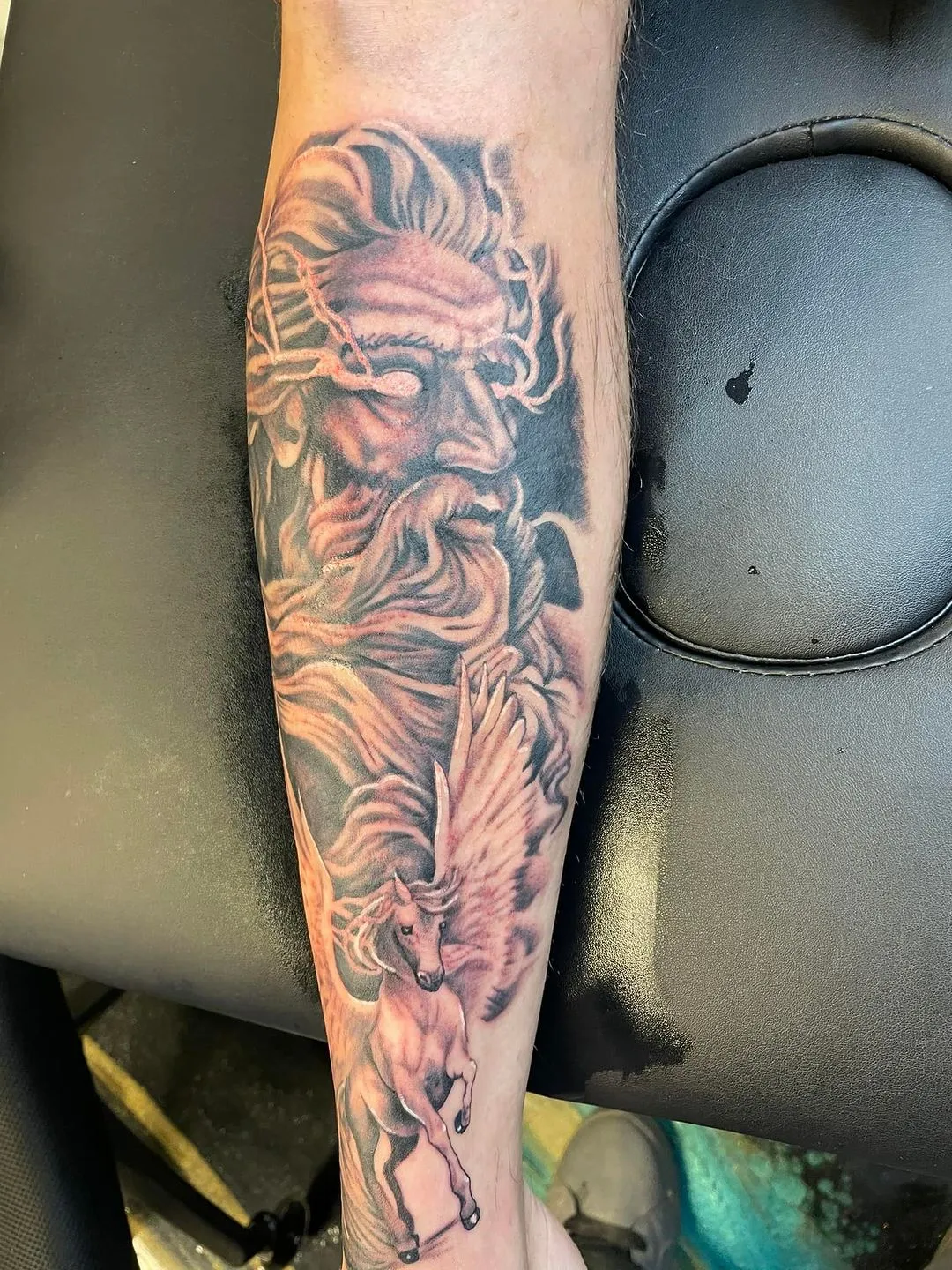 Tattoo by TJ Cornelius at Fallen Raven Tattoo Studio