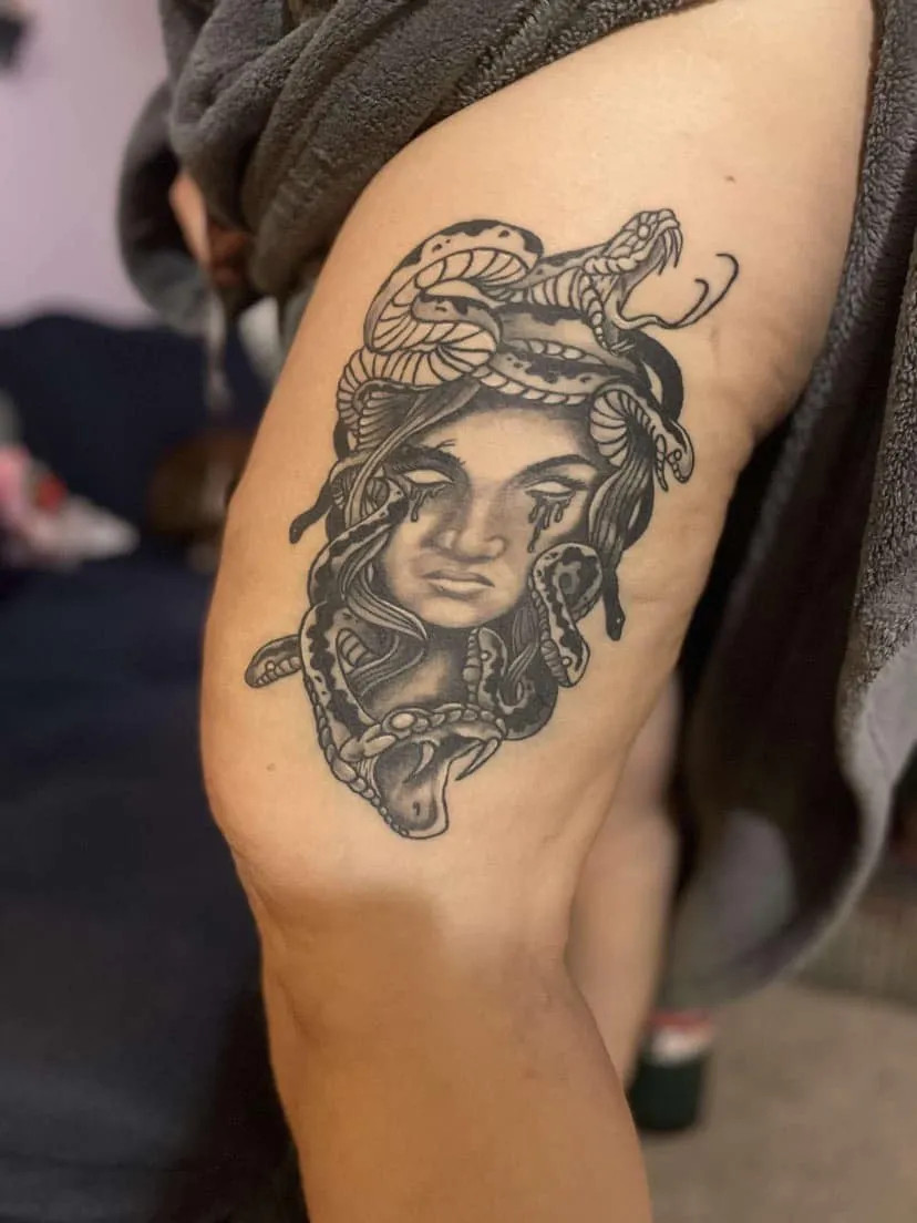 Tattoo by TJ Cornelius at Fallen Raven Tattoo Studio