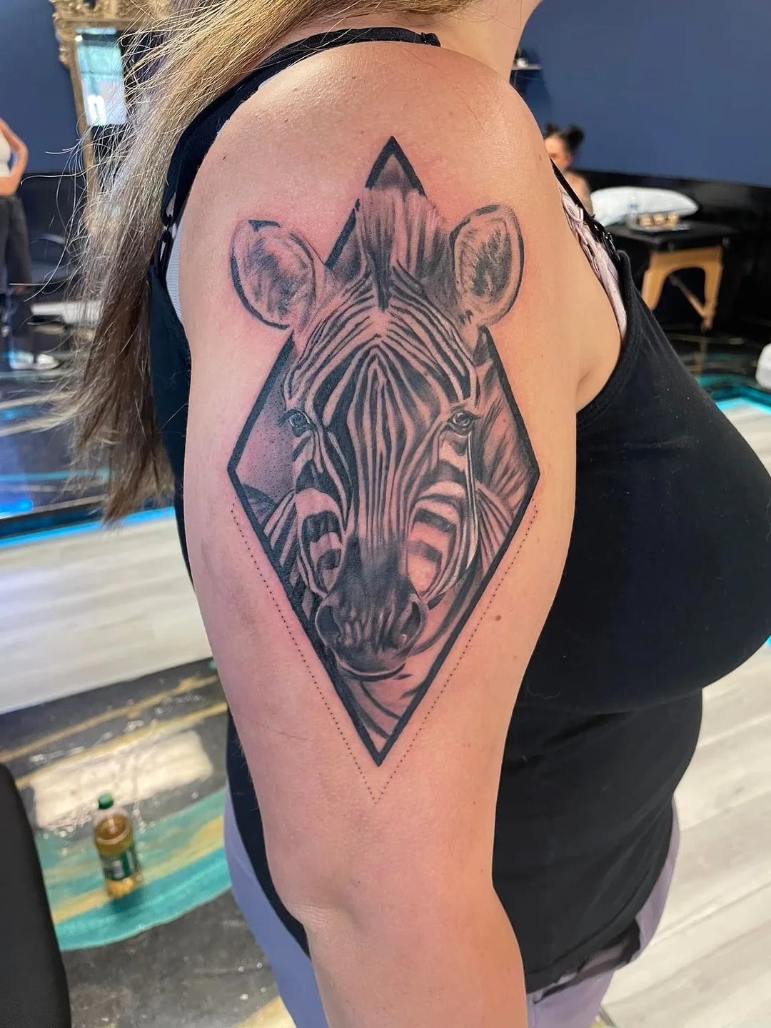 Tattoo by TJ Cornelius at Fallen Raven Tattoo Studio