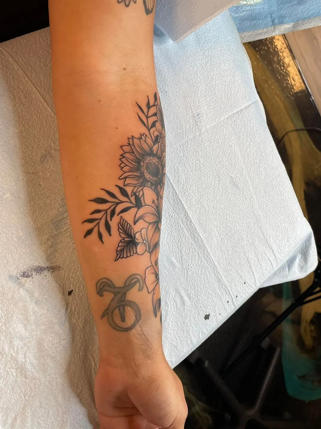 Tattoo by TJ Cornelius at Fallen Raven Tattoo Studio