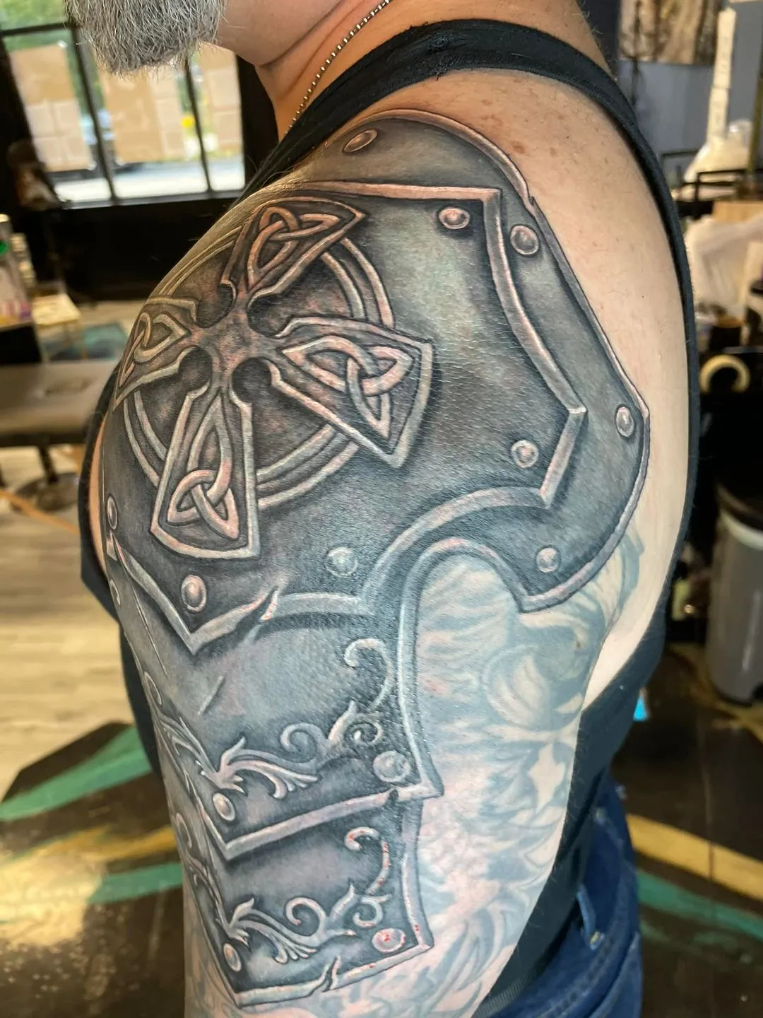 Tattoo by TJ Cornelius at Fallen Raven Tattoo Studio