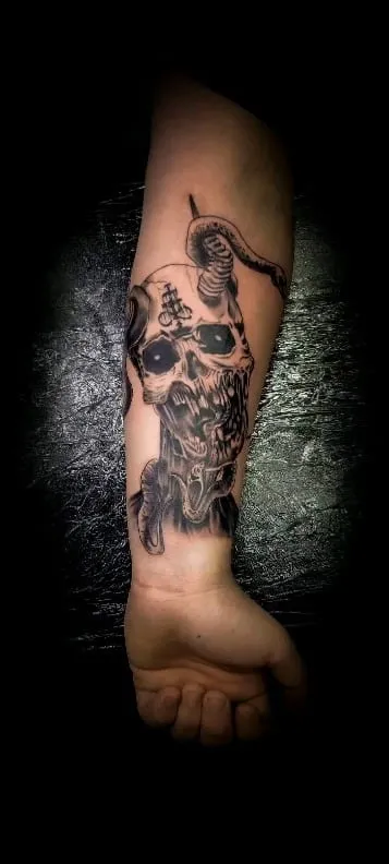 Tattoo by Pete Delia at Fallen Raven Tattoo Studio