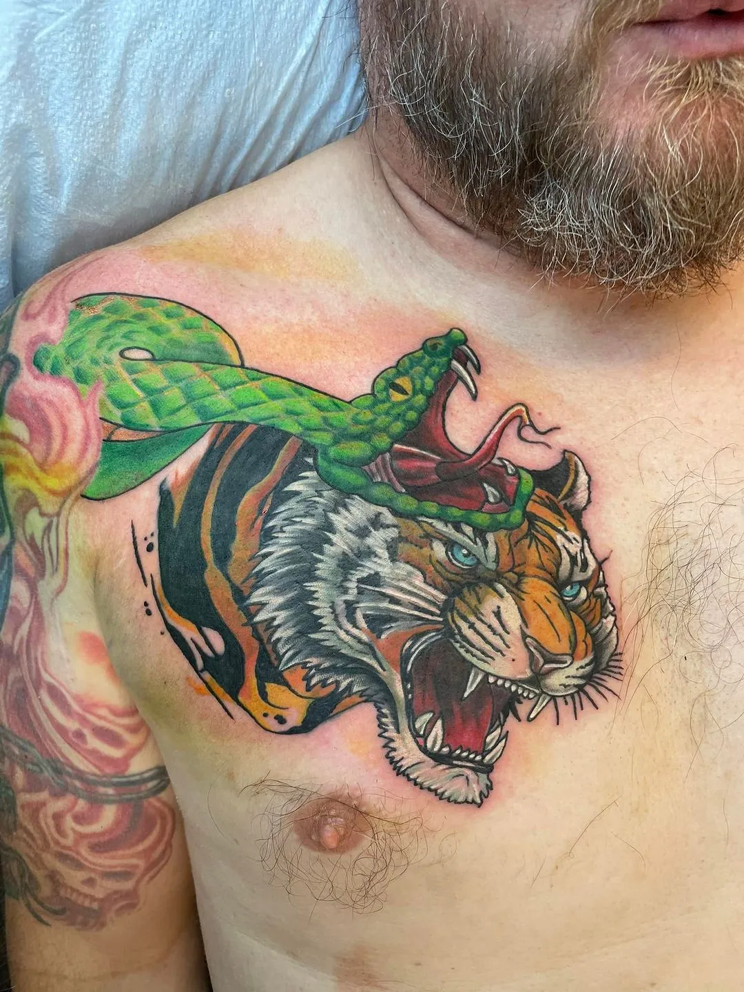 Tattoo by TJ Cornelius at Fallen Raven Tattoo Studio