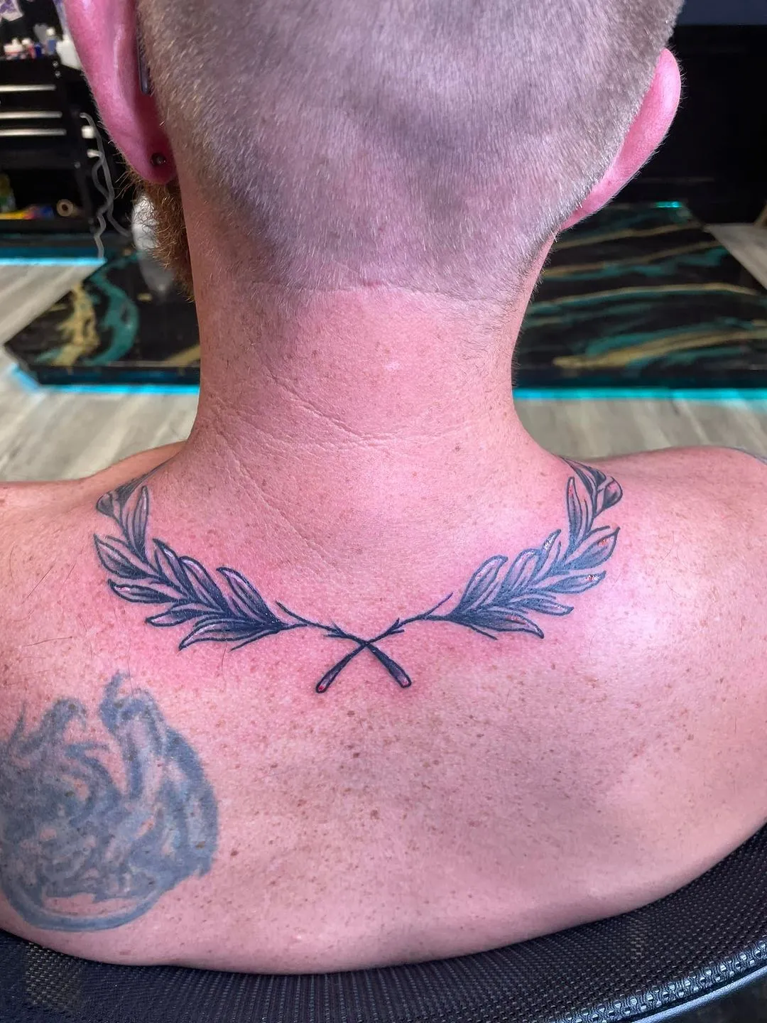 Tattoo by TJ Cornelius at Fallen Raven Tattoo Studio