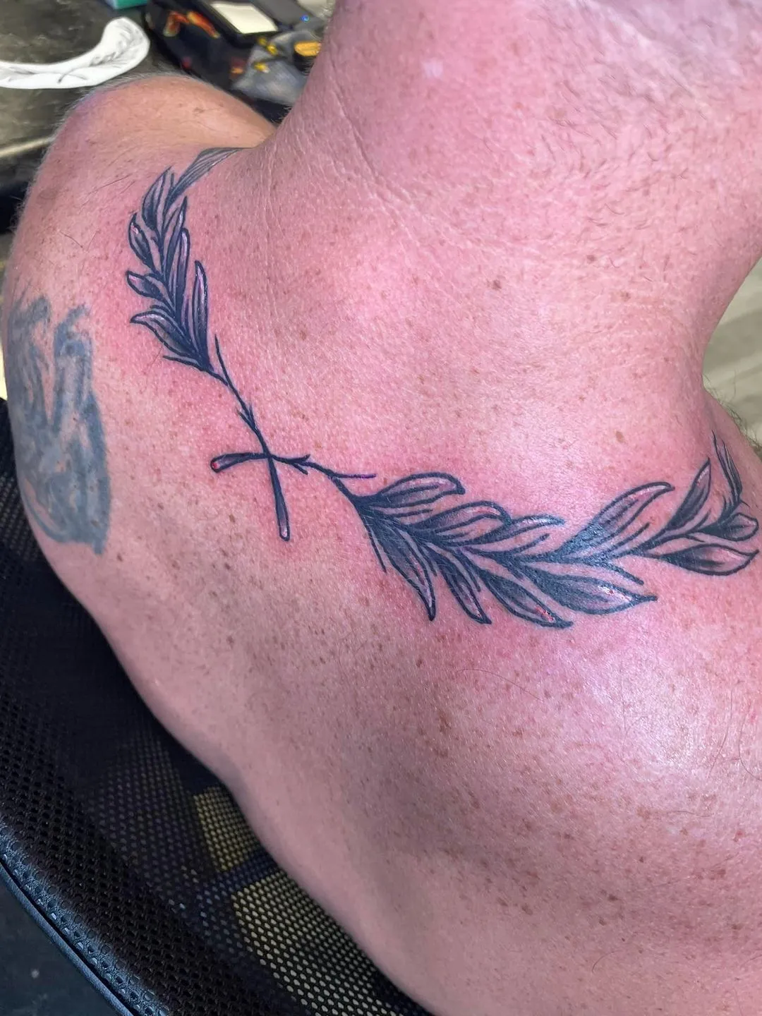 Tattoo by TJ Cornelius at Fallen Raven Tattoo Studio