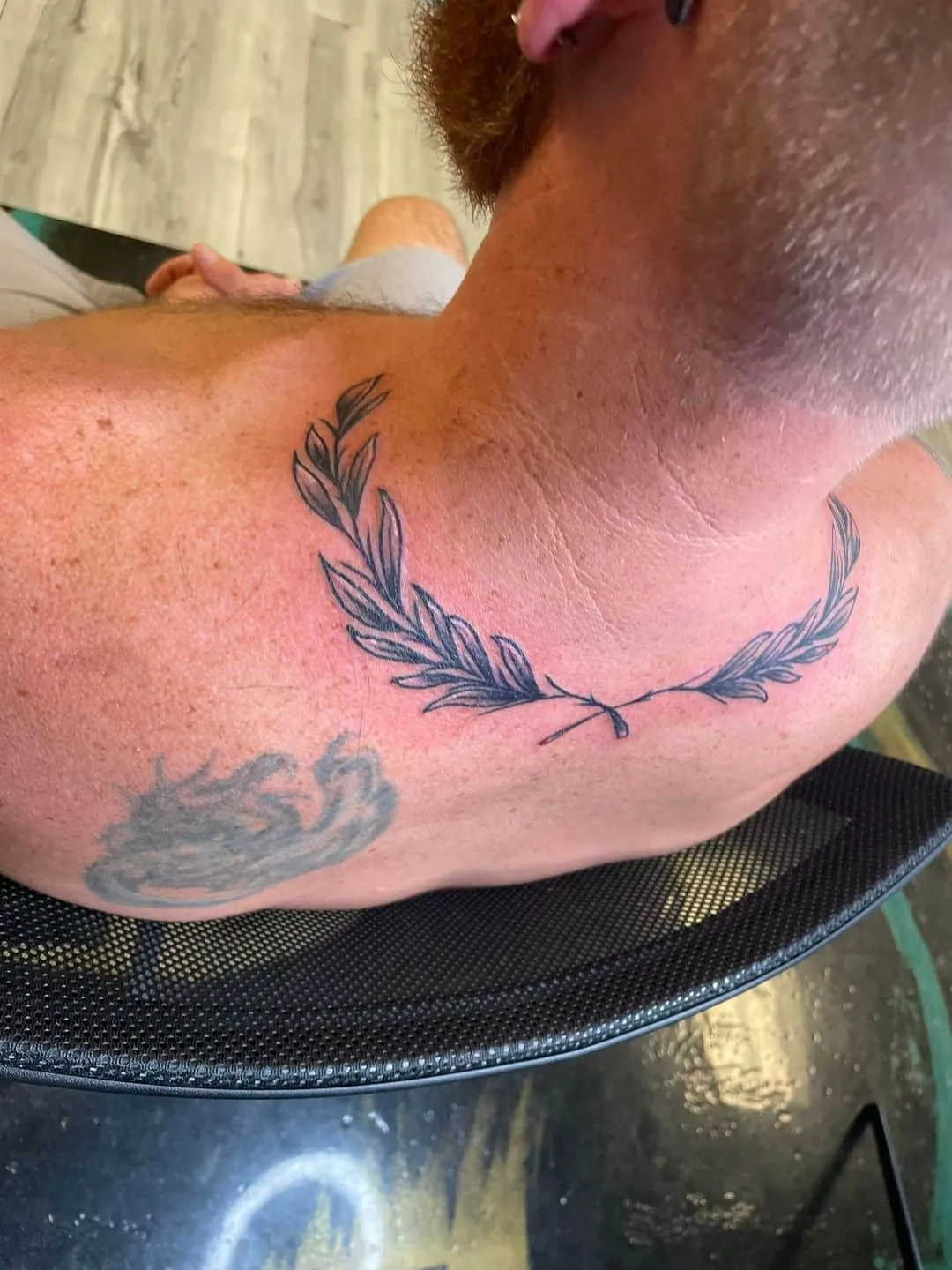 Tattoo by TJ Cornelius at Fallen Raven Tattoo Studio