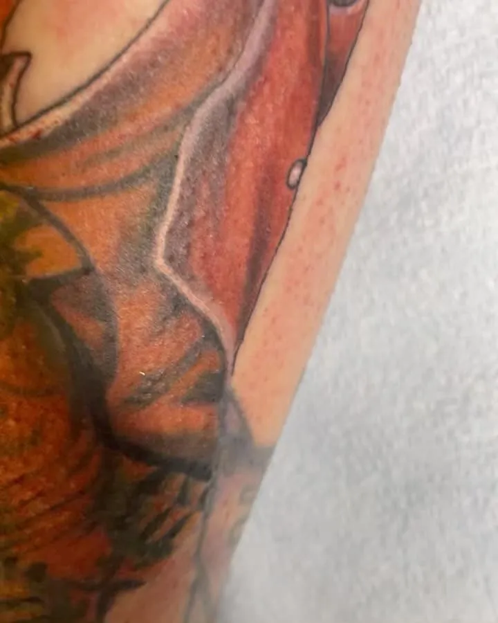 Tattoo by TJ Cornelius at Fallen Raven Tattoo Studio