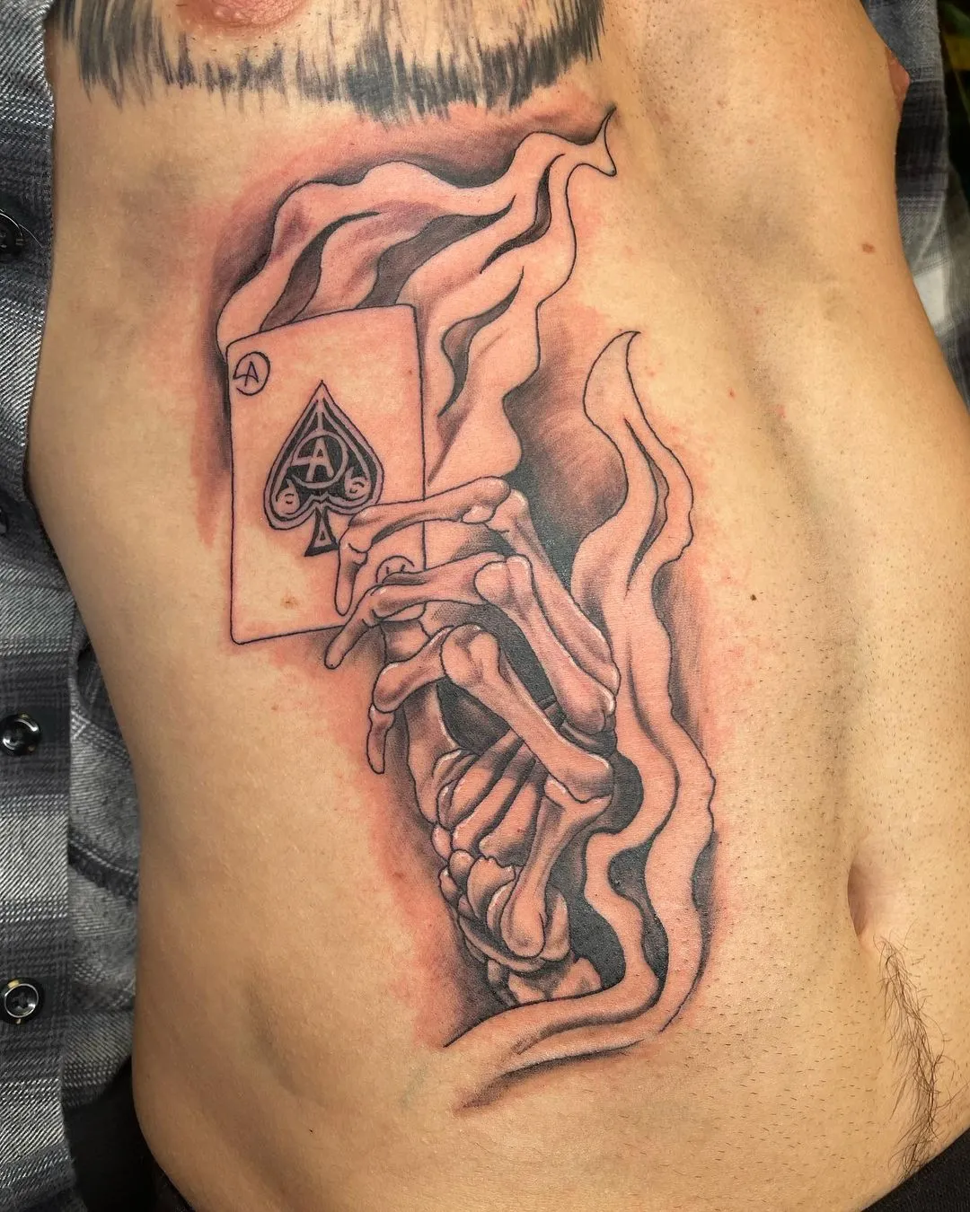 Tattoo by TJ Cornelius at Fallen Raven Tattoo Studio